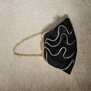 Black and gold Aldo Wristlet